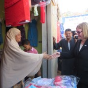 USAID/Egypt Mission Director Dr. Mary C. Ott shakes hands with one of 64 vendors at the newly-inaugurated Madinat Al Salam Marke