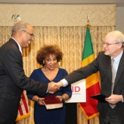 Gary C. Juste being sworn in as USAID Mission Director to Mali