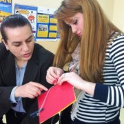 Teachers learning to bind books