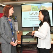 Carrie Thompson, Acting-Director, USAID Regional Development Mission for Asia (left) speakes to Maria Theresa Medialdia, Program