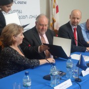 Mission Director Stephen M. Haykin signs MOU.