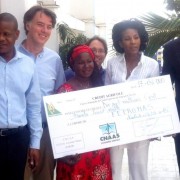 FEPROMAS producers receiving $30,000 check from the insurance company