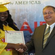 J’nievlyn Kelly of Washington Archibald High School, receives her prize