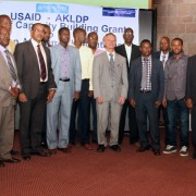 USAID Ethiopia Mission Director Dennis Weller (center) with representatives of the grant recipient organizations and project sta