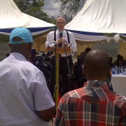 The U.S. Ambassador to Kenya delivers a speech behind a podium.