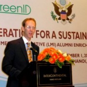 USAID Mission Director Joakim Parker addresses the LMI alumni in Hanoi.
