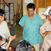 Dr. Viterman Ali, left, trains health providers and voluntary health workers in the Beni region of Bolivia how to use a malaria 