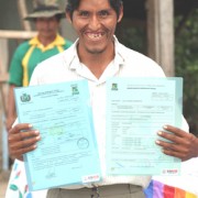 Julio Janko&ntilde;a, a Bolivian farmer in the Chapare region of Bolivia, proudly shows his legal land titles.