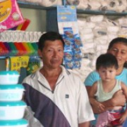 Blanca, Alberto, and one of their sons at their newly opened shop.