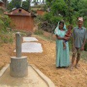 This family in Kaski, a mountainous region of central Nepal, benefited from a USAID program installing multi-use water systems. 