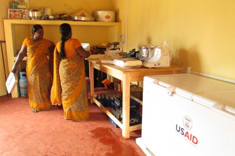 Women from Kallappadu North set up operations at their newly opened food processing center.