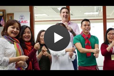 USAID/Vietnam Staff and Partners Use Sign Language to Express Support for Persons with Disabilities